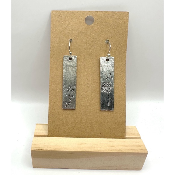 Jewelry - Dandelion earrings are stamped silver-tone bar drop earrings